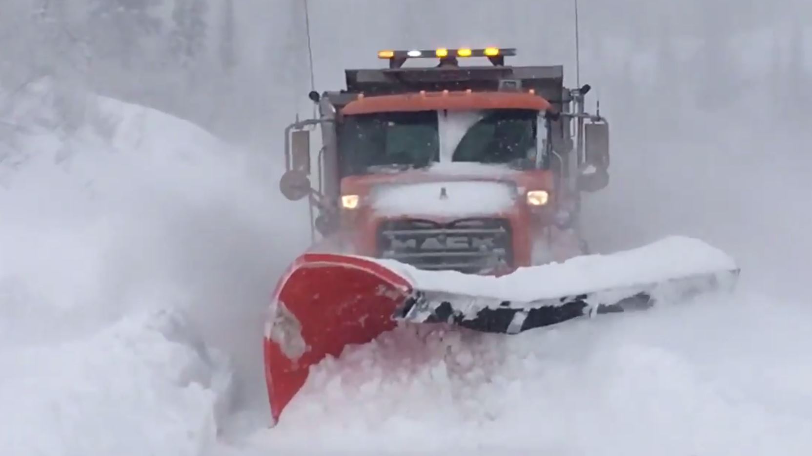 Watch plow clear feet of snow from Little Cottonwood Canyon