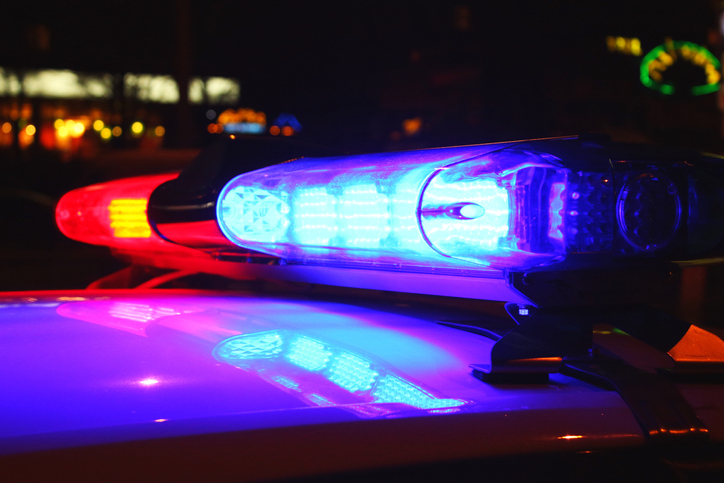 A close-up photo of police lights by night Police lights siren file photo